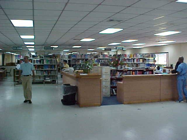The library's front desk and reference shelfs.